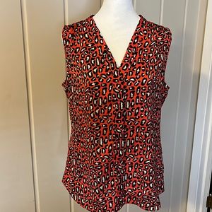 Beautiful tank in a cute leopard print. Banana Republic size 10.